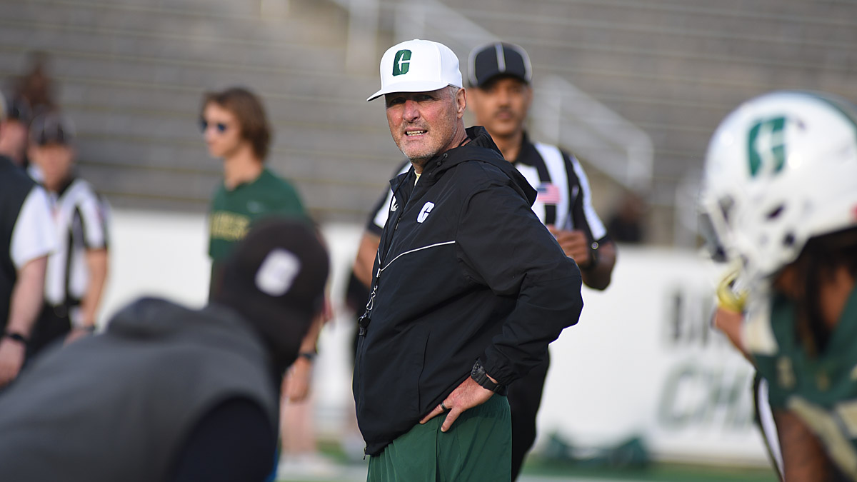 Tim Brewster has been named Charlotte 49ers football interim coach.