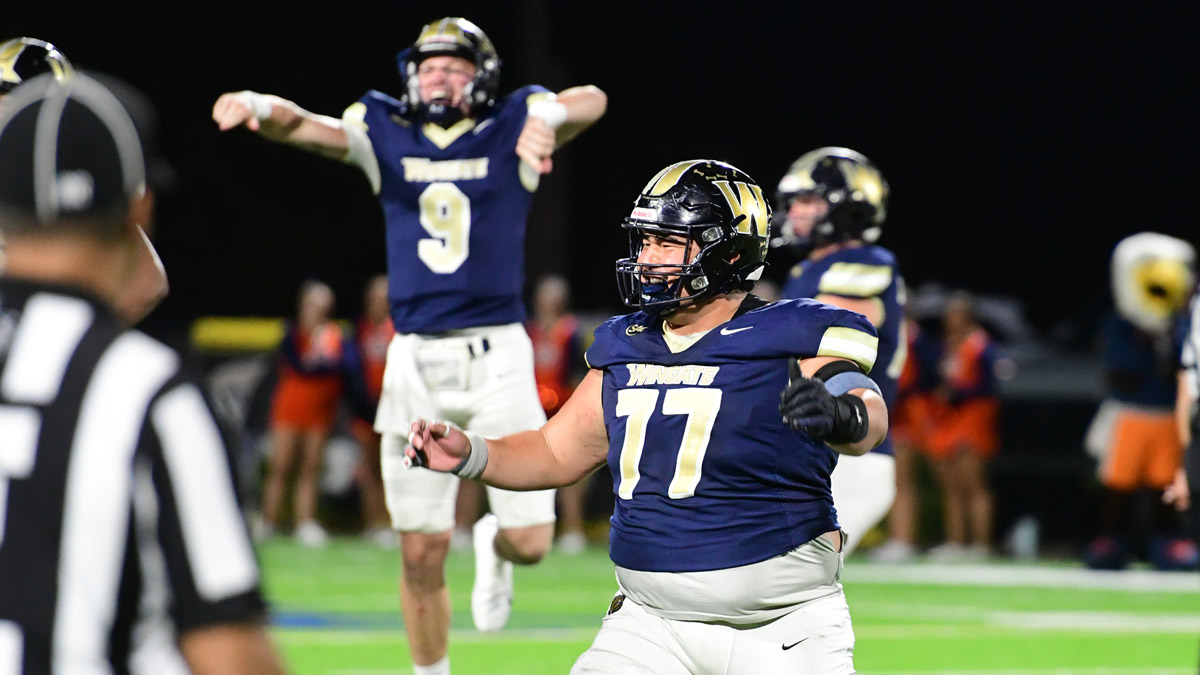 Wingate football players celebrate their South Atlantic Conference title win