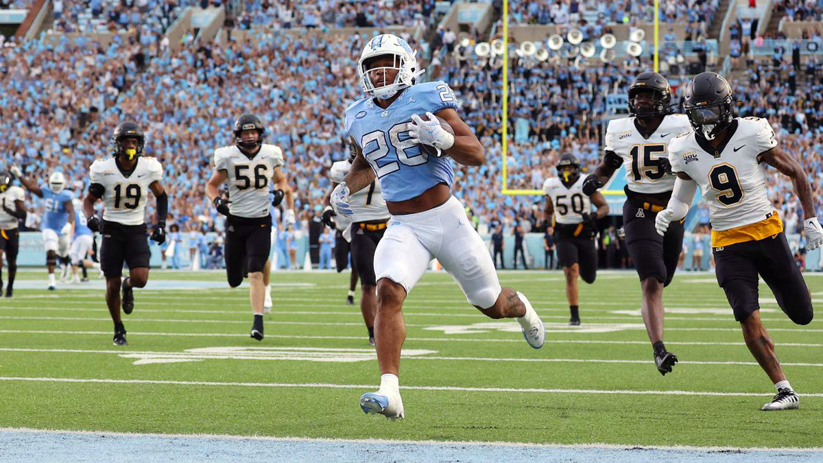 North Carolina running back Omarion Hampton scores a touchdown against Wake Forest