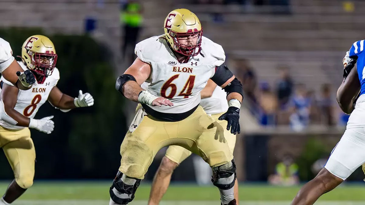 Elon offensive lineman Kevin Burkett blocking against Duke.