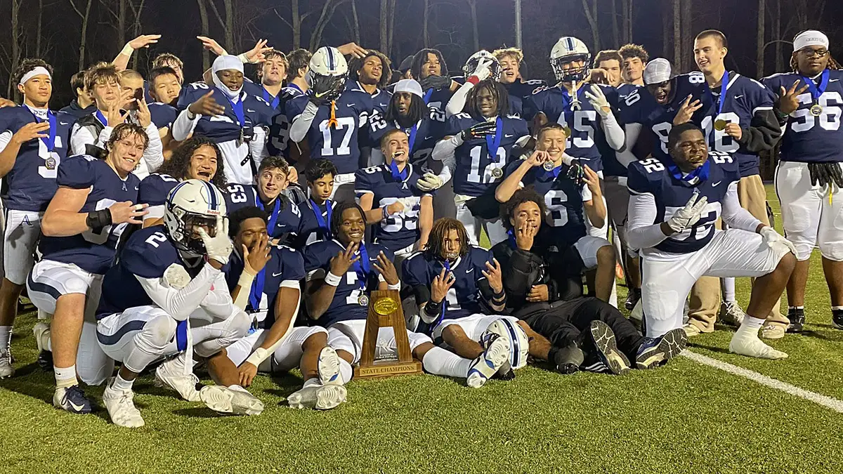 Asheville School players celebrate their 2024 state championship in NCISAA Division II