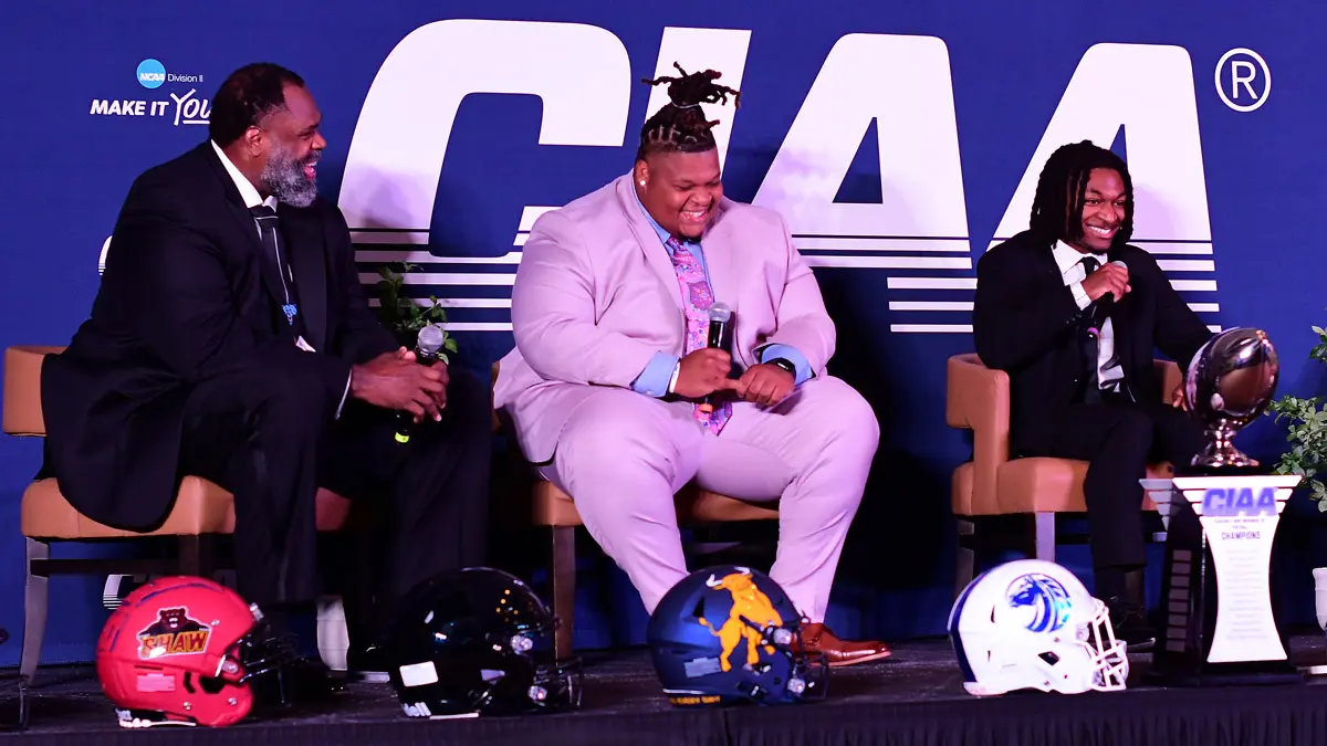 Livingstone football, represented by Livingstone football upset Johnson C. Smith to end last season. The Blue Bears, represented here by coach Sean Gilbert, defensive lineman David Jones and running back Calvin Scott, talk during media day in Durham.day in Durham.