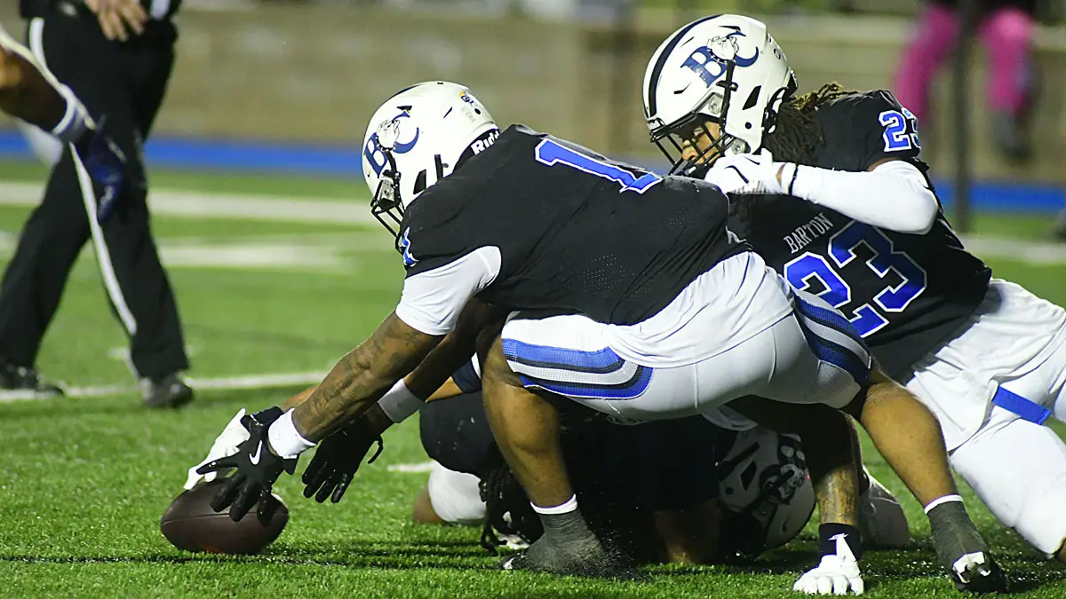 Barton football player Savionne Rogers tries to pounce on a loose ball in the Bulldogs' Aug. 28, 2025 game against Virginia State