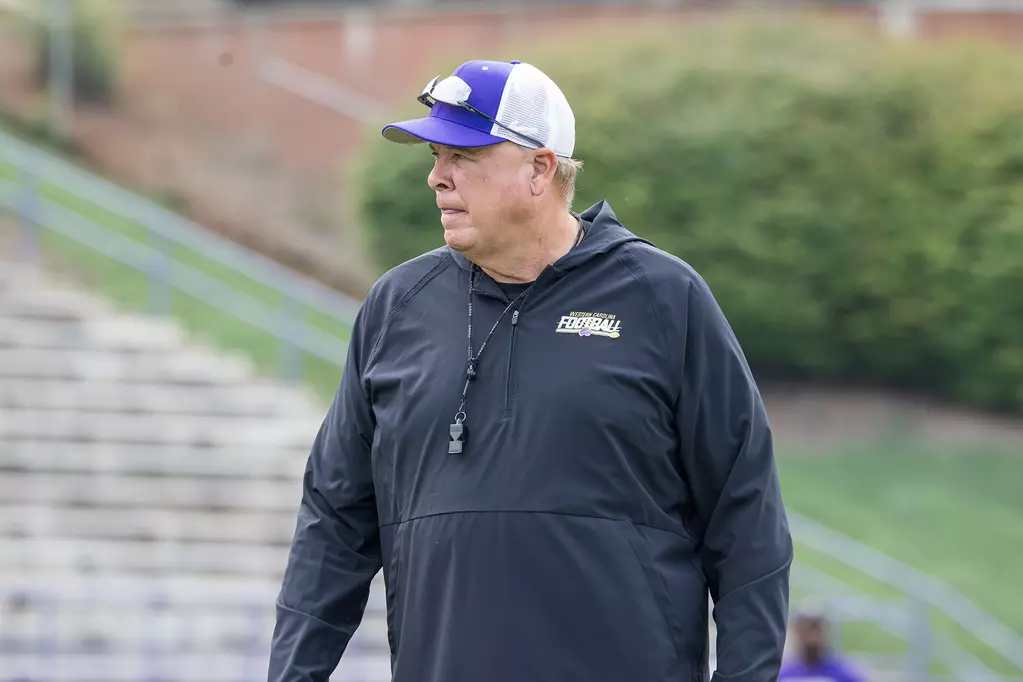 Western Carolina football coach Kerwin Bell watches his team during an August preseason scrimmage.