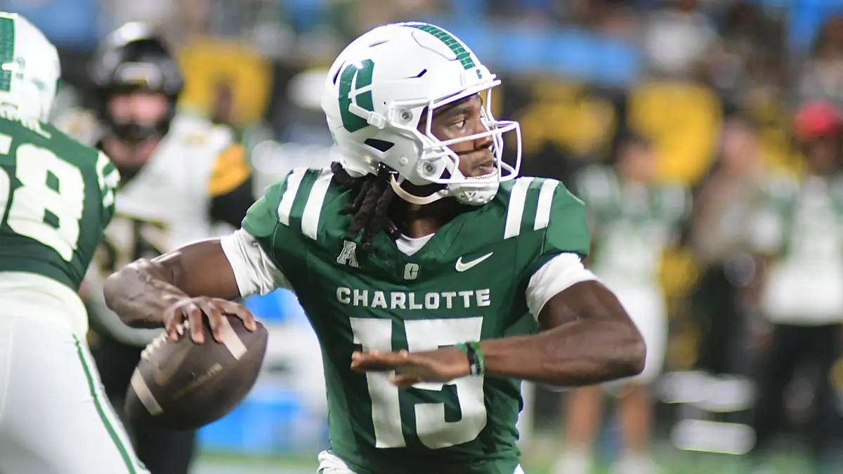 Charlotte quarterback Conner Harrell looks to throw against Appalachian State in the season opener.