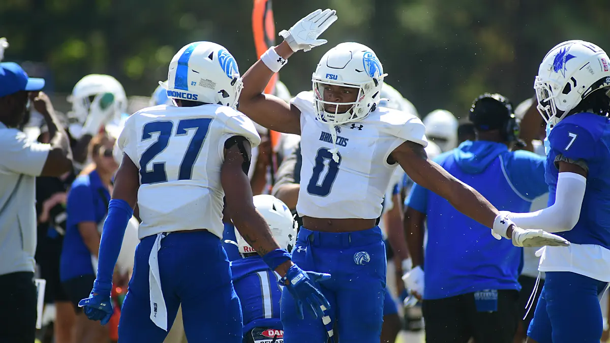 Fayetteville State players celebrate after a big play against Elizabeth City State in the Down East Viking Classic.