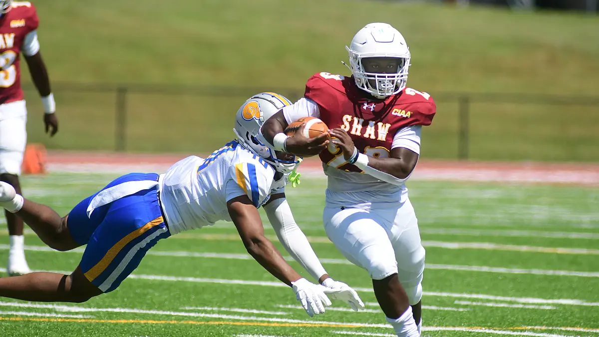 Shaw running back Fabian Diggs eludes an Albany State tackler in the Bears' season opener.