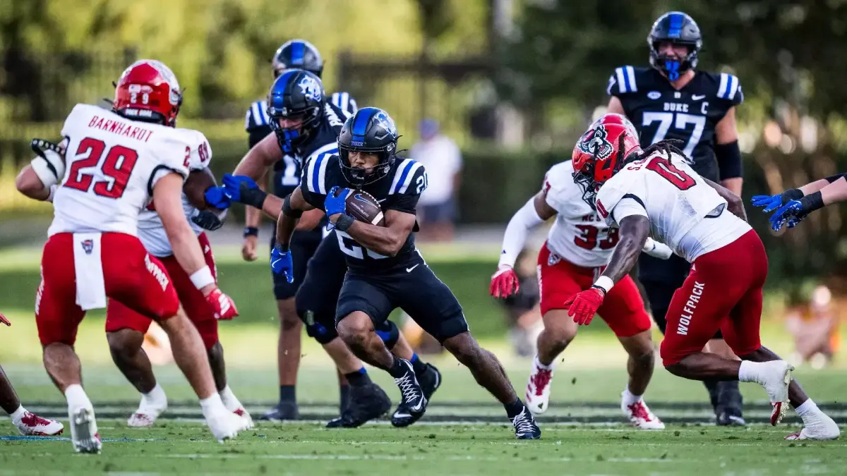 Duke football running back Nate Sheppard looks for yardage up the middle against NC State during the 2025 season.