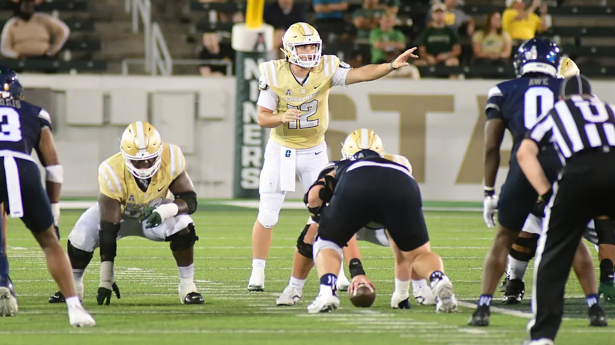 Grayson Loftis | Charlotte QB - NCFootballNews Charlotte quarterback Grayson Lofits barks out signals to his teammates during a game against Rice in September 2025.