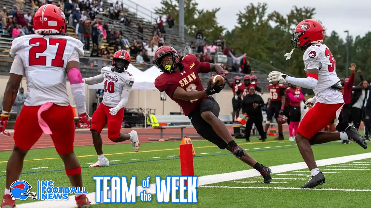 Shaw's Tyrek Hardison finds the end zone between multiple Winston-Salem State defenders in the fourth quarter of the Bears' CIAA game.