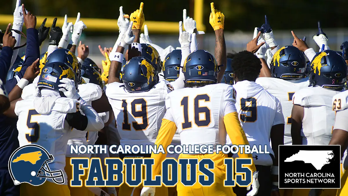 Johnson C. Smith football players point to the sky during a huddle before the start of the fourth quarter against Fayetteville State.