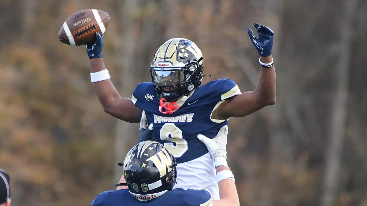 Wingate football's Jaylen Himes celebrates a touchdown in the win over Benedict on Nov. 22.
