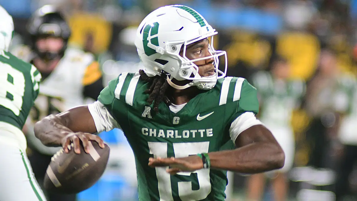Charlotte 49ers quarterback Conner Harrell aims downfield in a game against Appalachian State.